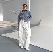 Dames Trendy Losvallende Gestreepte Cropped Blouse met Strikdetail | Gelaine