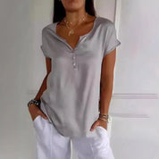 Dames Tijdloze Elegante V-Hals Top met Knoop Detail | Tebora