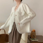 Dames Modieuze Trendy Parijs Style fluffy Vest met Parelknopen | Romee