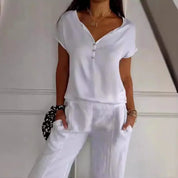 Dames Tijdloze Elegante V-Hals Top met Knoop Detail | Tebora